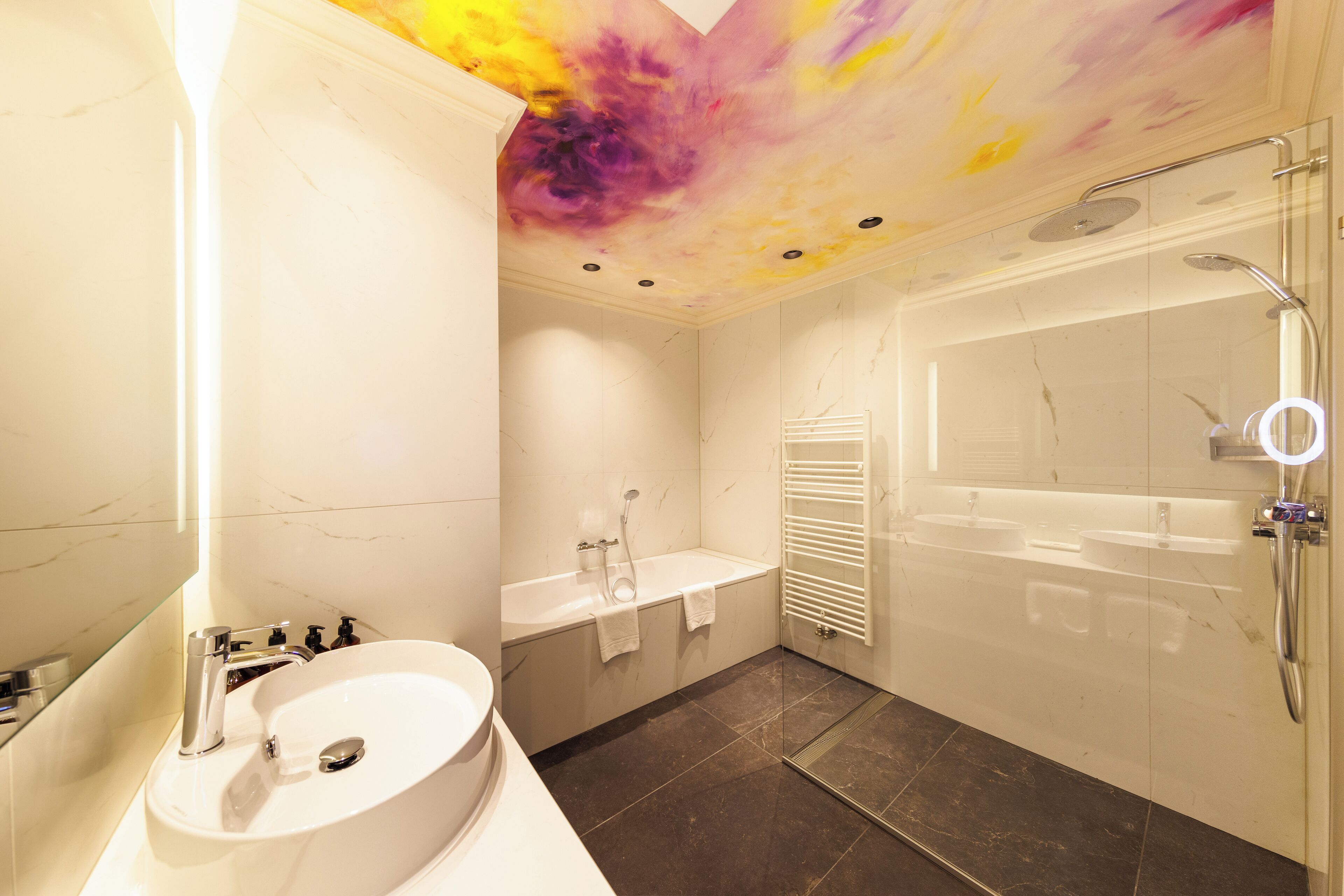 junior suite | bathroom | eco-friendly toiletries, hair dryer, towels, soap