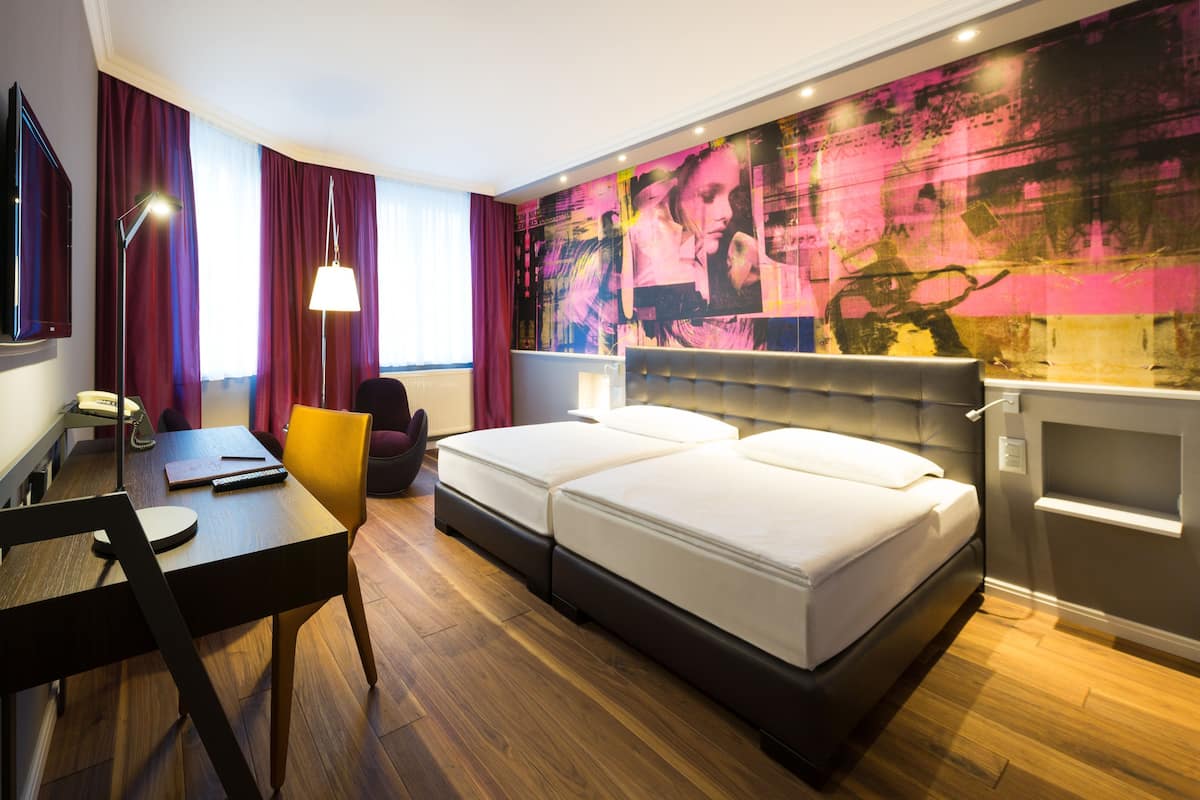 Hypo-allergenic bedding, minibar, in-room safe, individually decorated