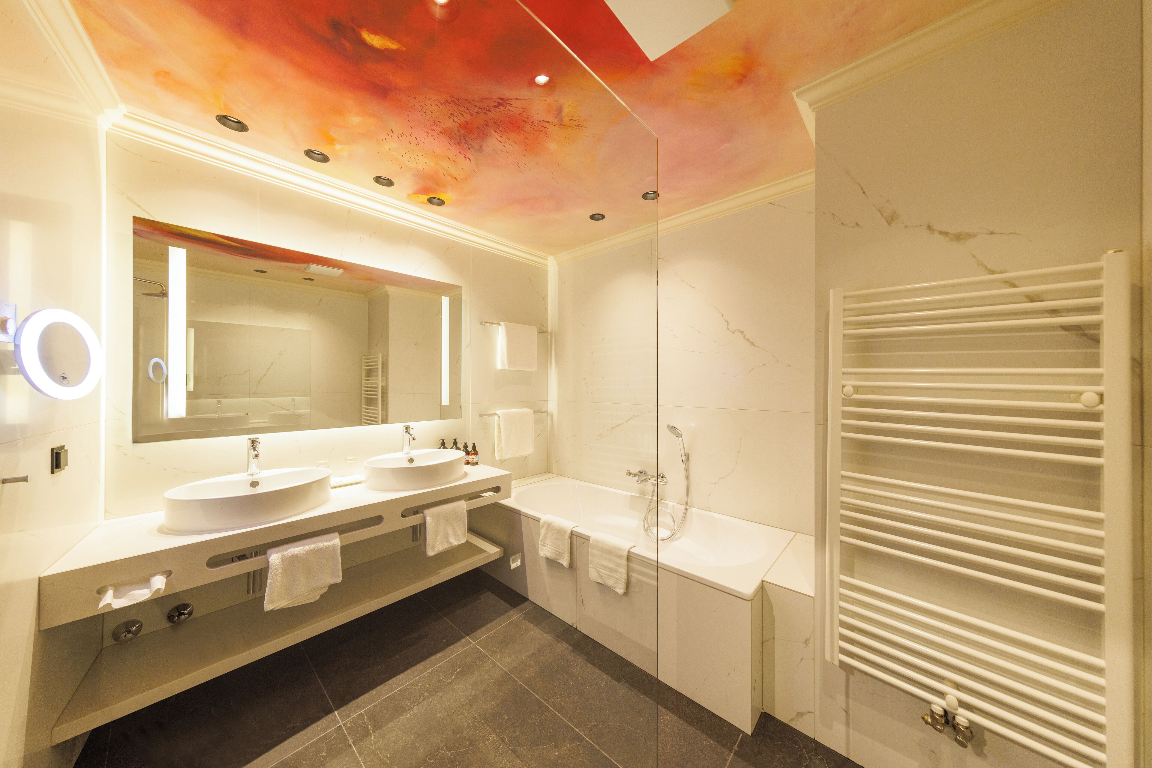 junior suite | bathroom | eco-friendly toiletries, hair dryer, towels, soap