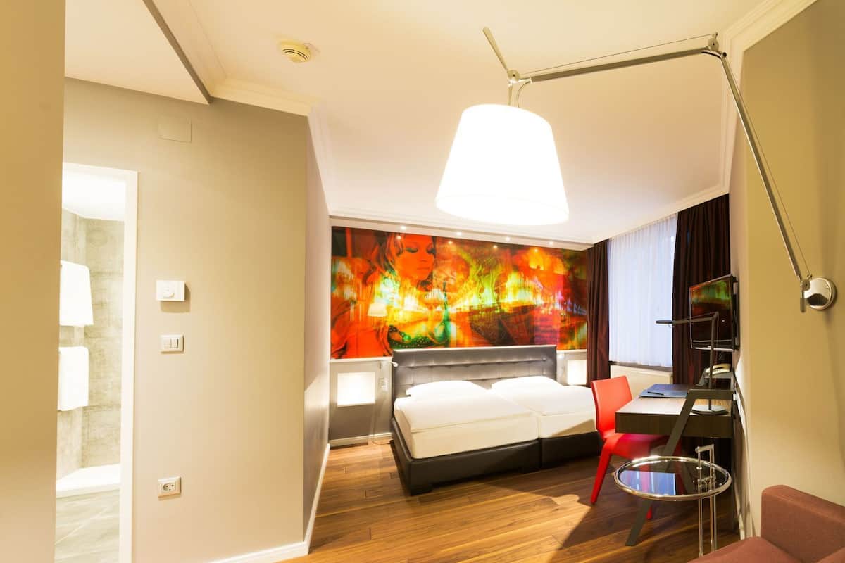 Hypo-allergenic bedding, minibar, in-room safe, individually decorated