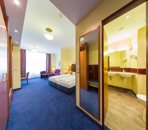 Standard Quadruple Room, City View | Hypo-allergenic bedding, in-room safe, desk, blackout drapes