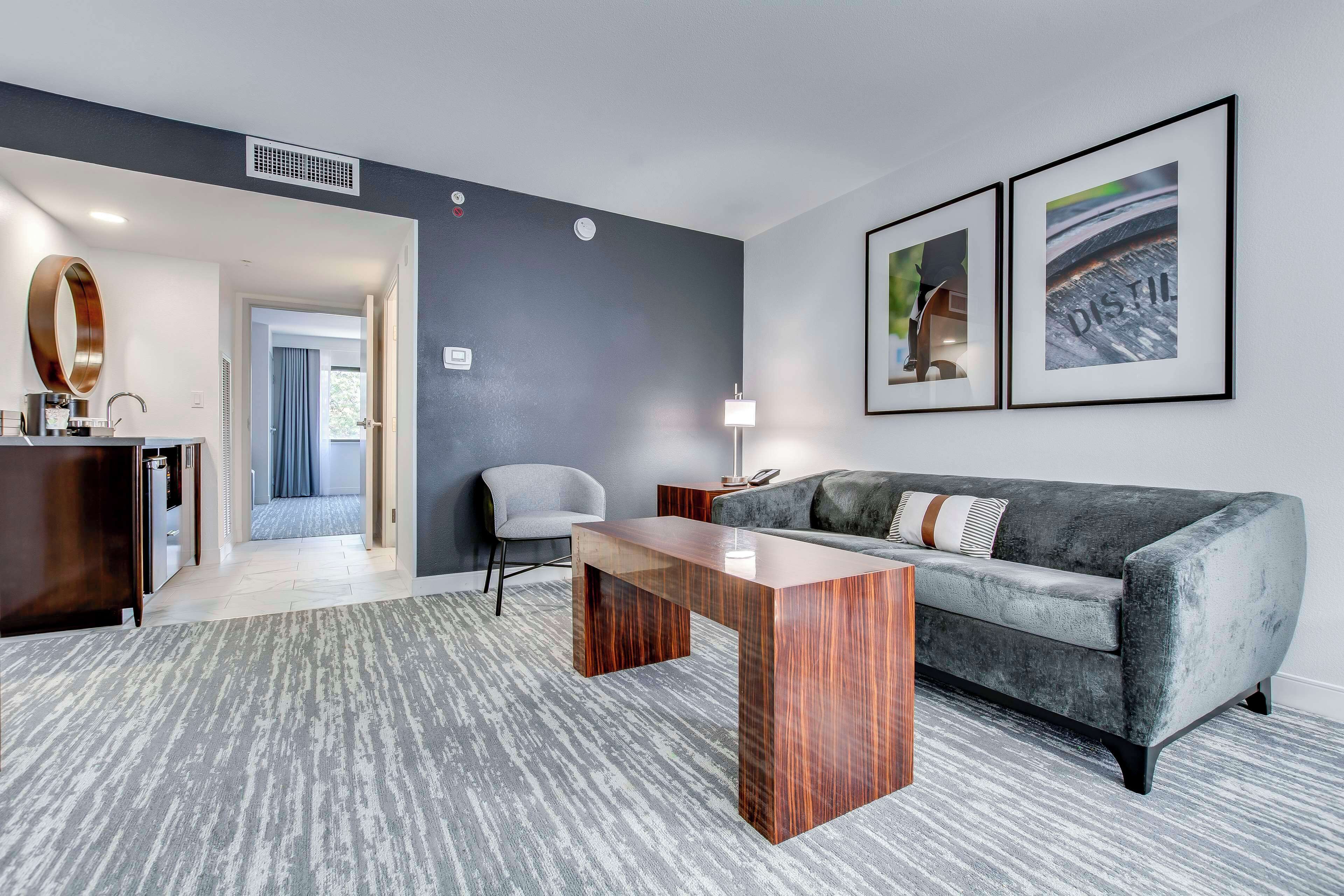 executive, one king bed, non-smoking | living area | 55-inch lcd tv with cable channels, tv