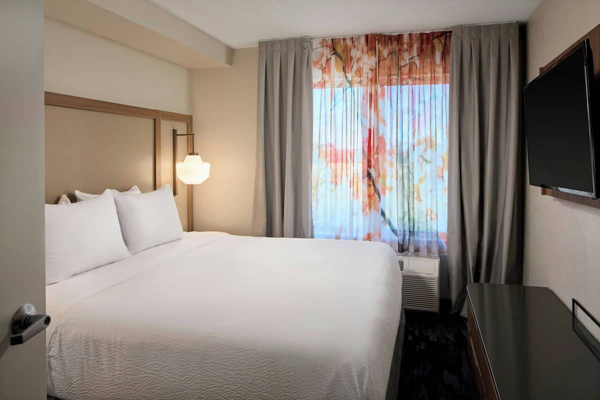 Suite, 1 Bedroom | Hypo-allergenic bedding available, down comforters, in-room safe, desk