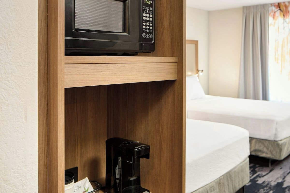 Hypo-allergenic bedding available, down comforters, in-room safe, desk