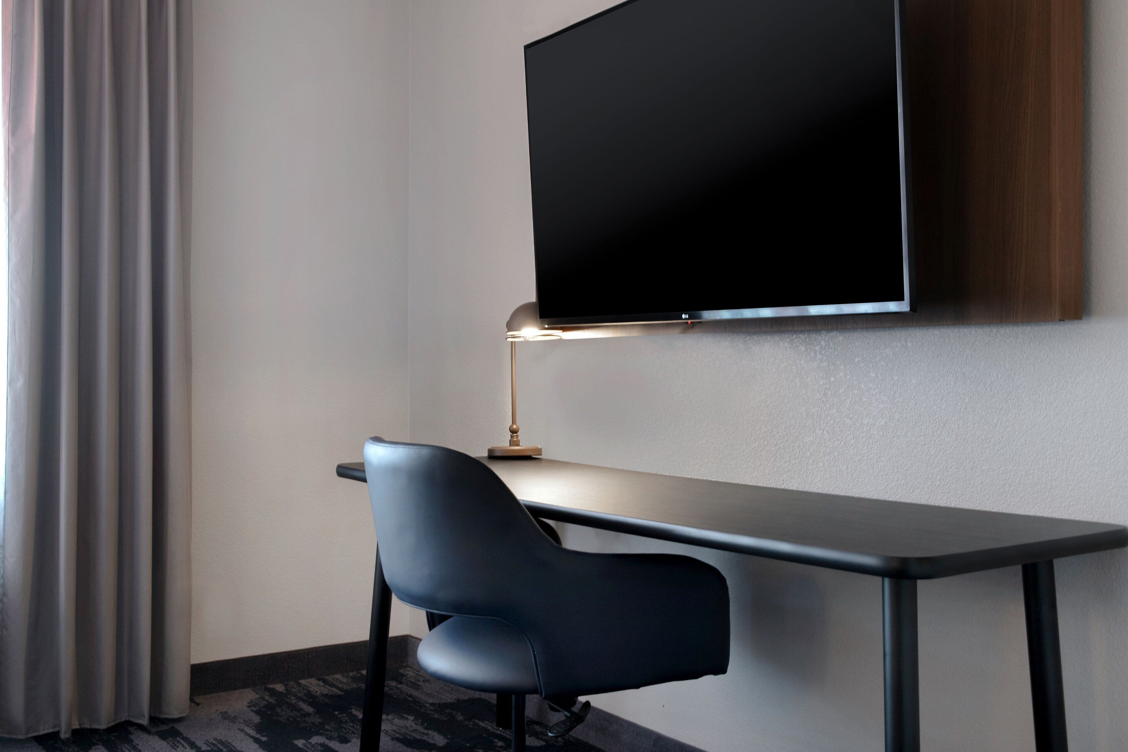 desk, blackout curtains, iron/ironing board, free cots/infant beds