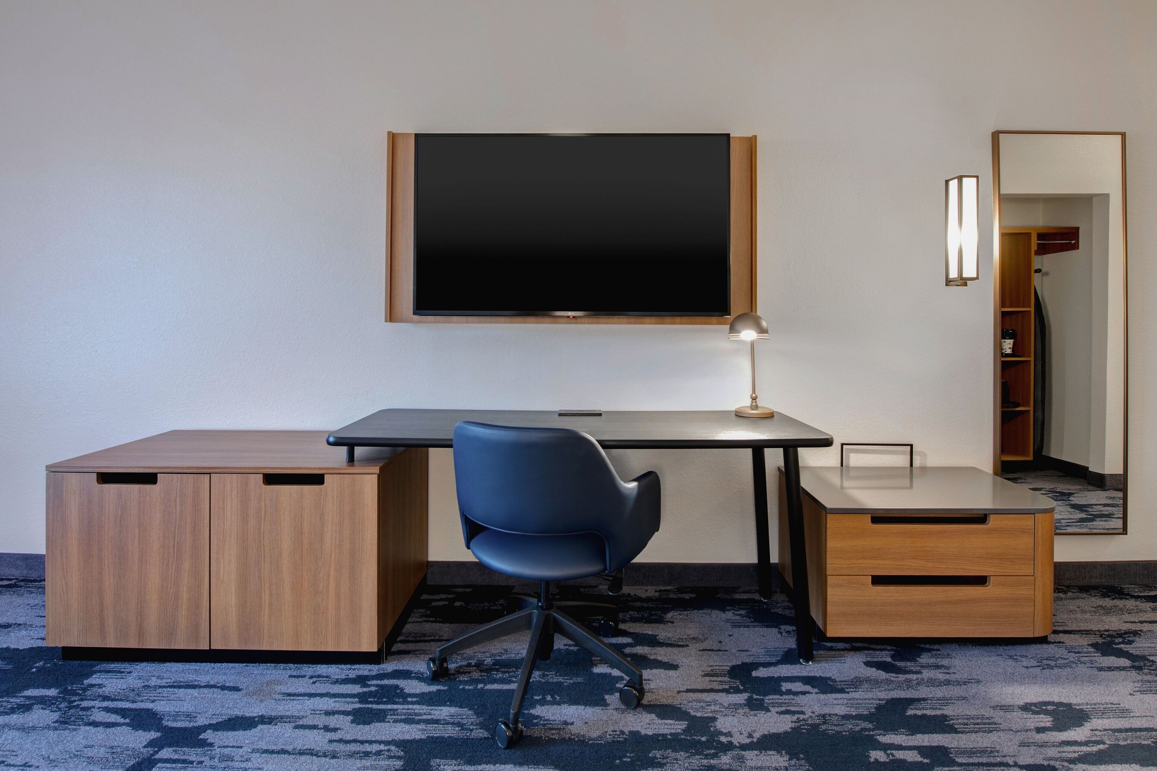 desk, blackout curtains, iron/ironing board, free cots/infant beds