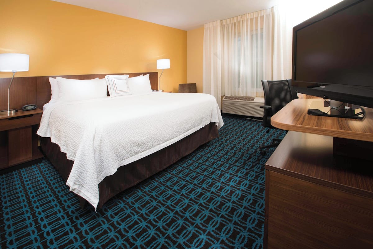 room, 1 king bed | premium bedding, desk, laptop workspace, blackout curtains