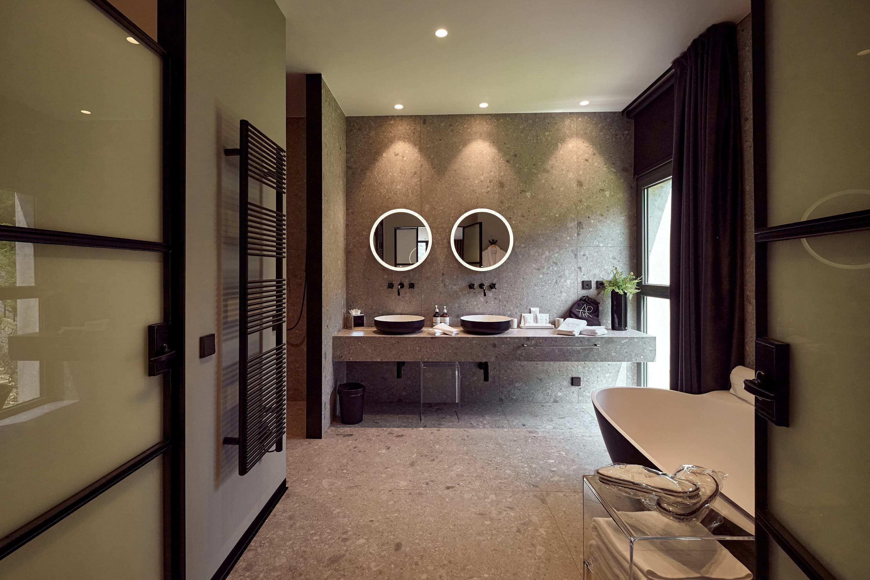 separate bathtub and shower, jetted bath, rainfall showerhead