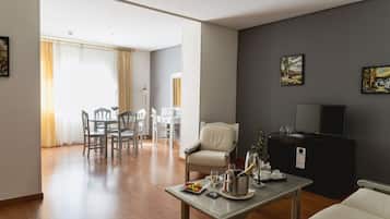Junior Suite | Living area | 19-inch LED TV with digital channels, TV