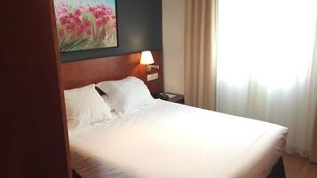 Room | Down comforters, minibar, in-room safe, desk