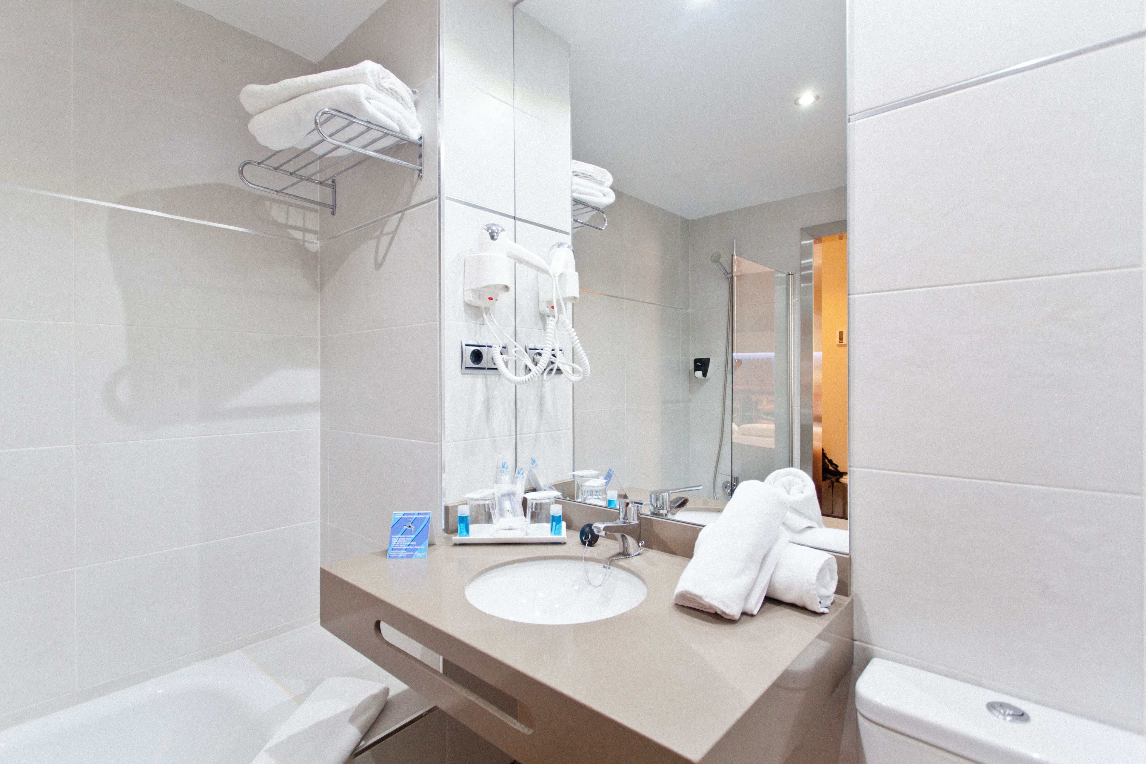 free toiletries, hair dryer, towels, soap