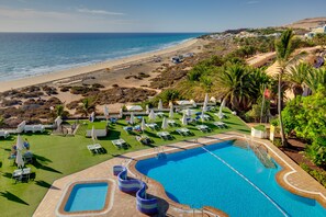 Outdoor pool, a lap pool, pool umbrellas, sun loungers - SBH Crystal Beach Hotel & Suites - Adults Only (Pajara)