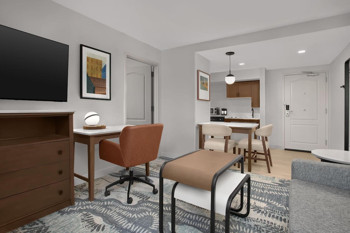 Suite, 2 Queen Beds, Accessible, Non Smoking (Mobility & Hearing, Roll-in Shower) | Living area | 27-inch flat-screen TV with satellite channels, TV, pay movies
