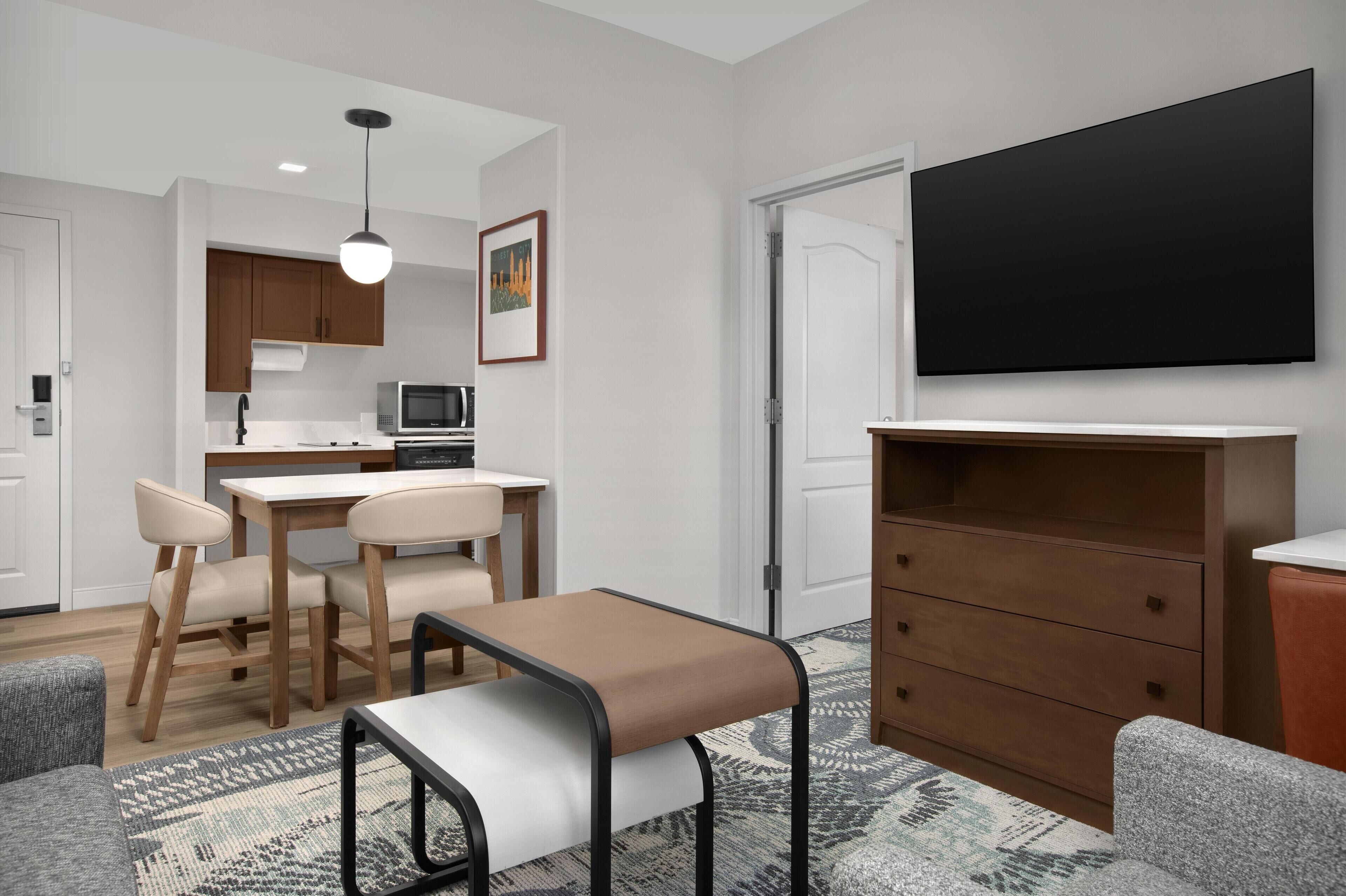 Suite, 1 King Bed, Accessible, Bathtub (Mobility & Hearing) | Living area | 27-inch flat-screen TV with satellite channels, TV, pay movies
