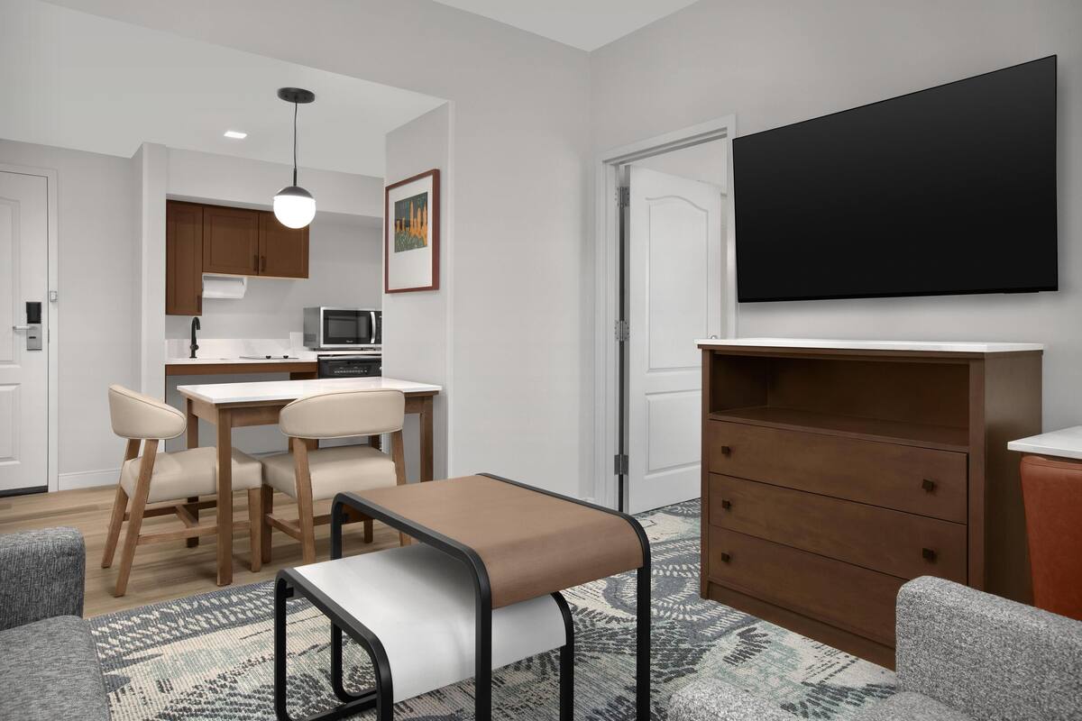 Suite, 1 King Bed, Accessible, Bathtub (Mobility & Hearing) | Living area | 27-inch flat-screen TV with satellite channels, TV, pay movies