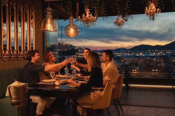 Breakfast, lunch, dinner served; Mediterranean cuisine, pool views