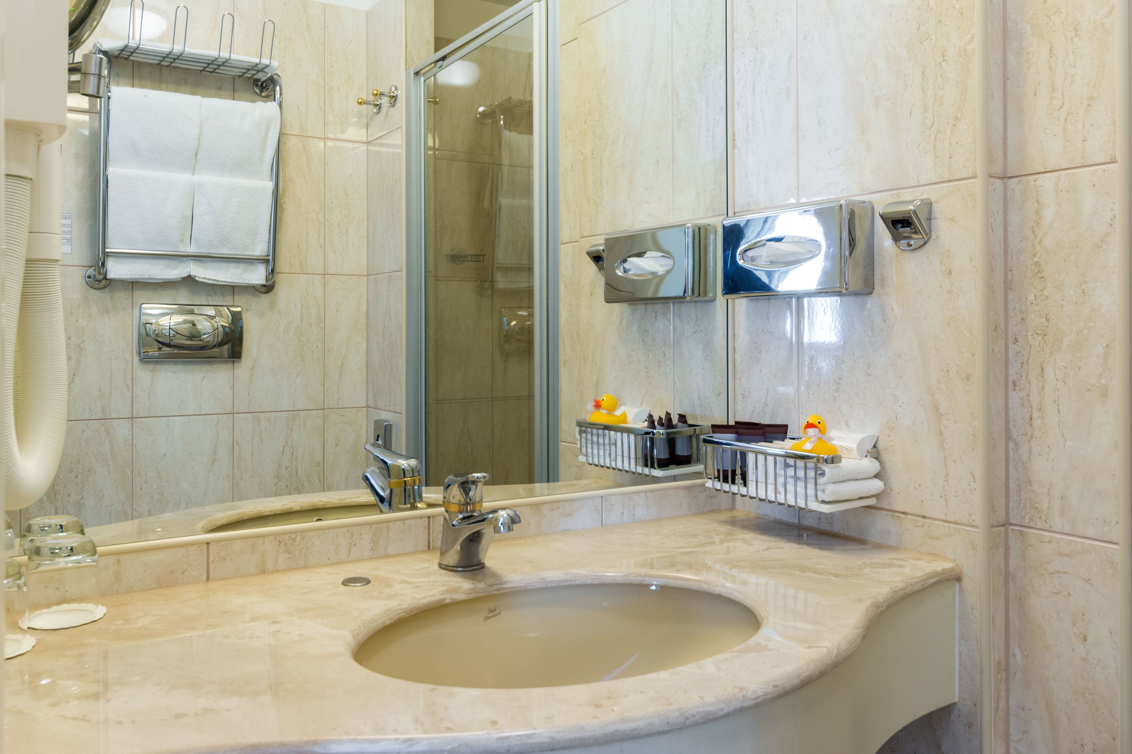 shower, free toiletries, hair dryer, heated floors