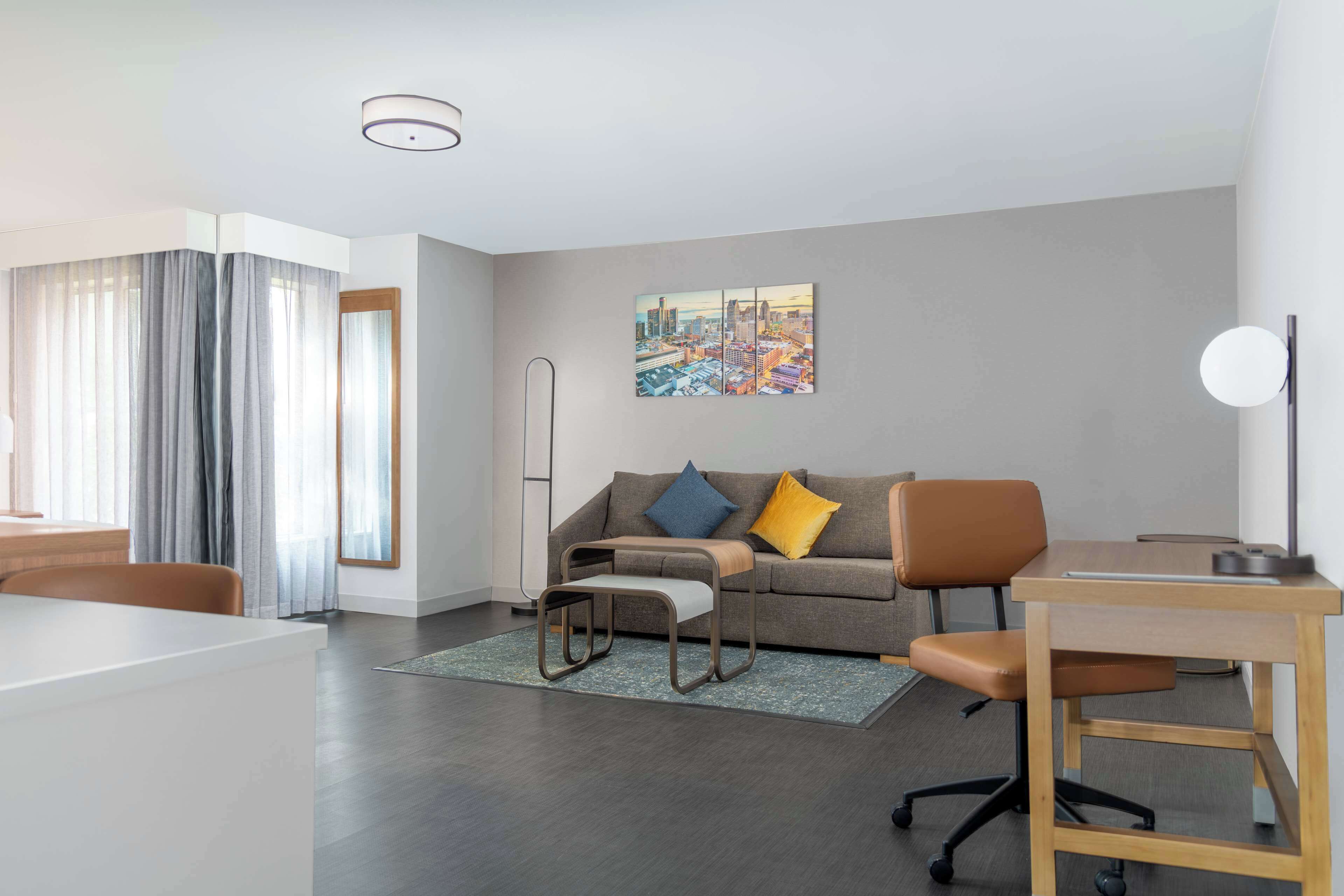 premium studio, 1 king bed, non smoking | in-room safe, desk, laptop workspace, blackout curtains