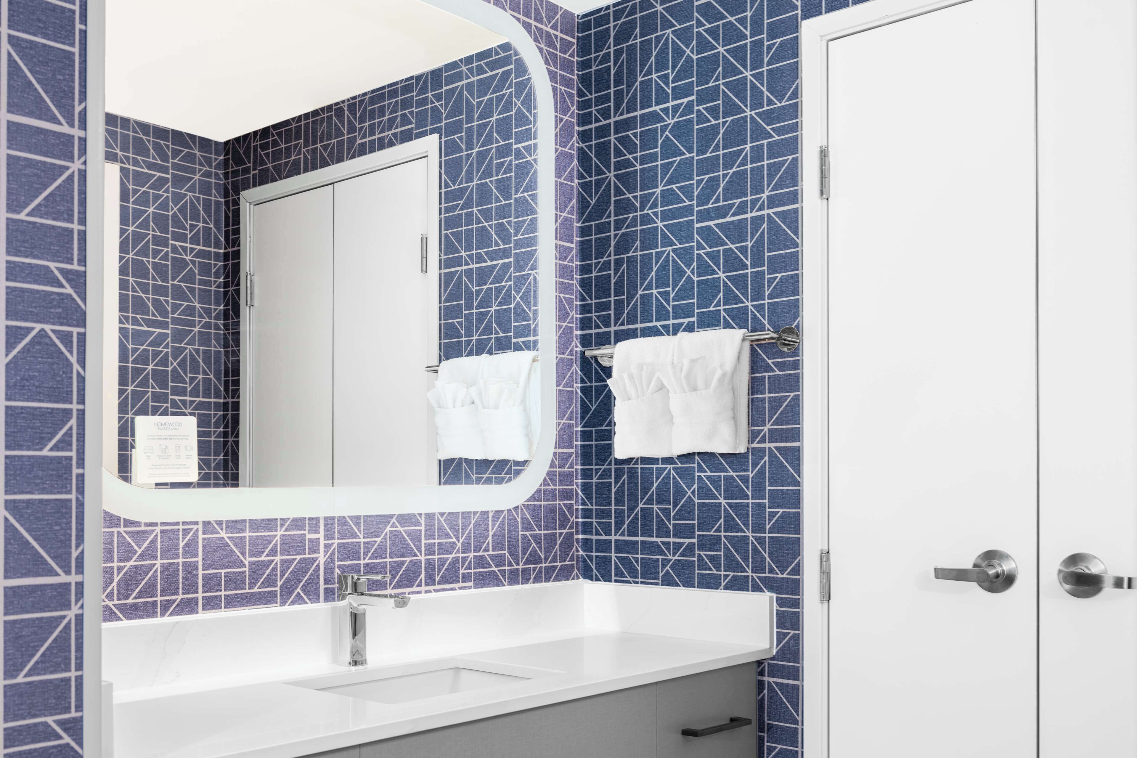 combined shower/bathtub, free toiletries, hair dryer, towels