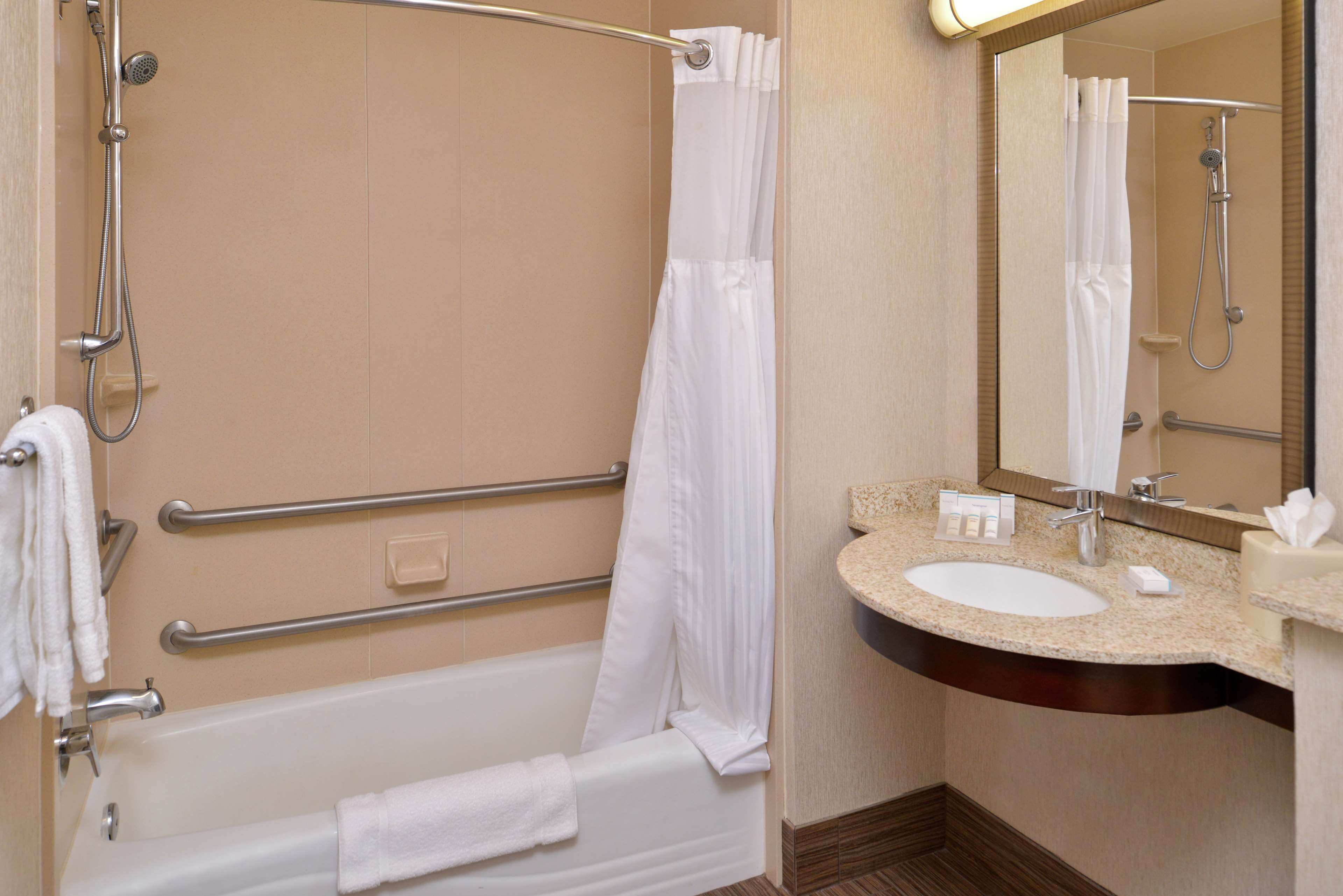 combined shower/bathtub, free toiletries, hair dryer, towels