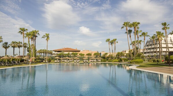 Seasonal outdoor pool, free pool cabanas, pool umbrellas