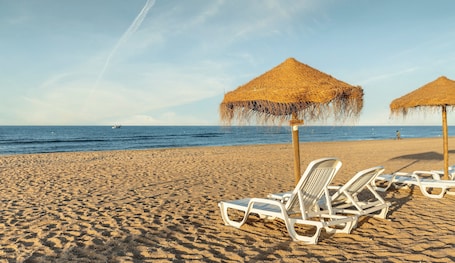 On the beach, white sand. Hotel ILUNION Islantilla