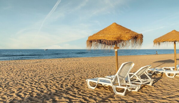 On the beach, white sand