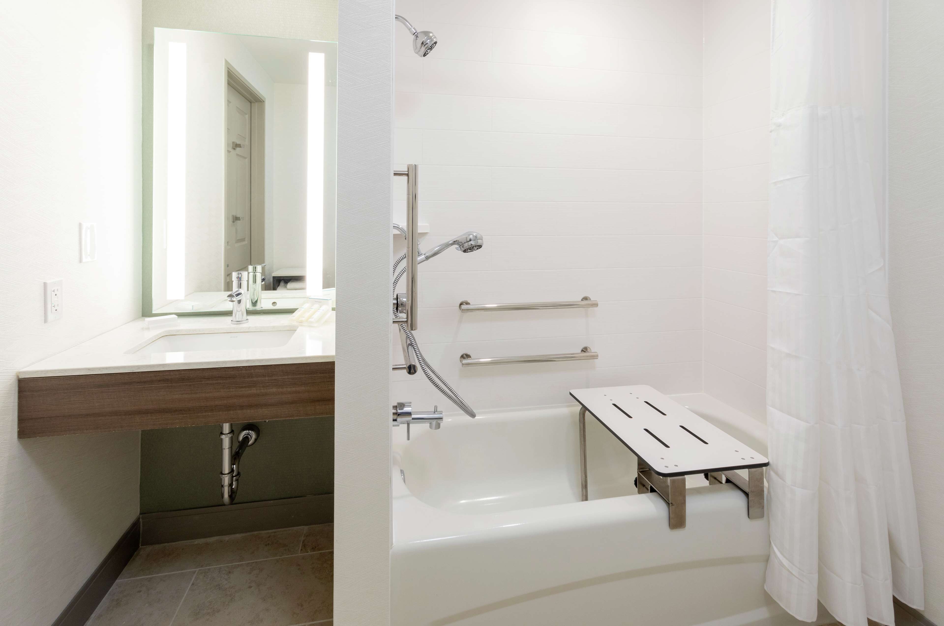 designer toiletries, hair dryer, bathrobes, towels