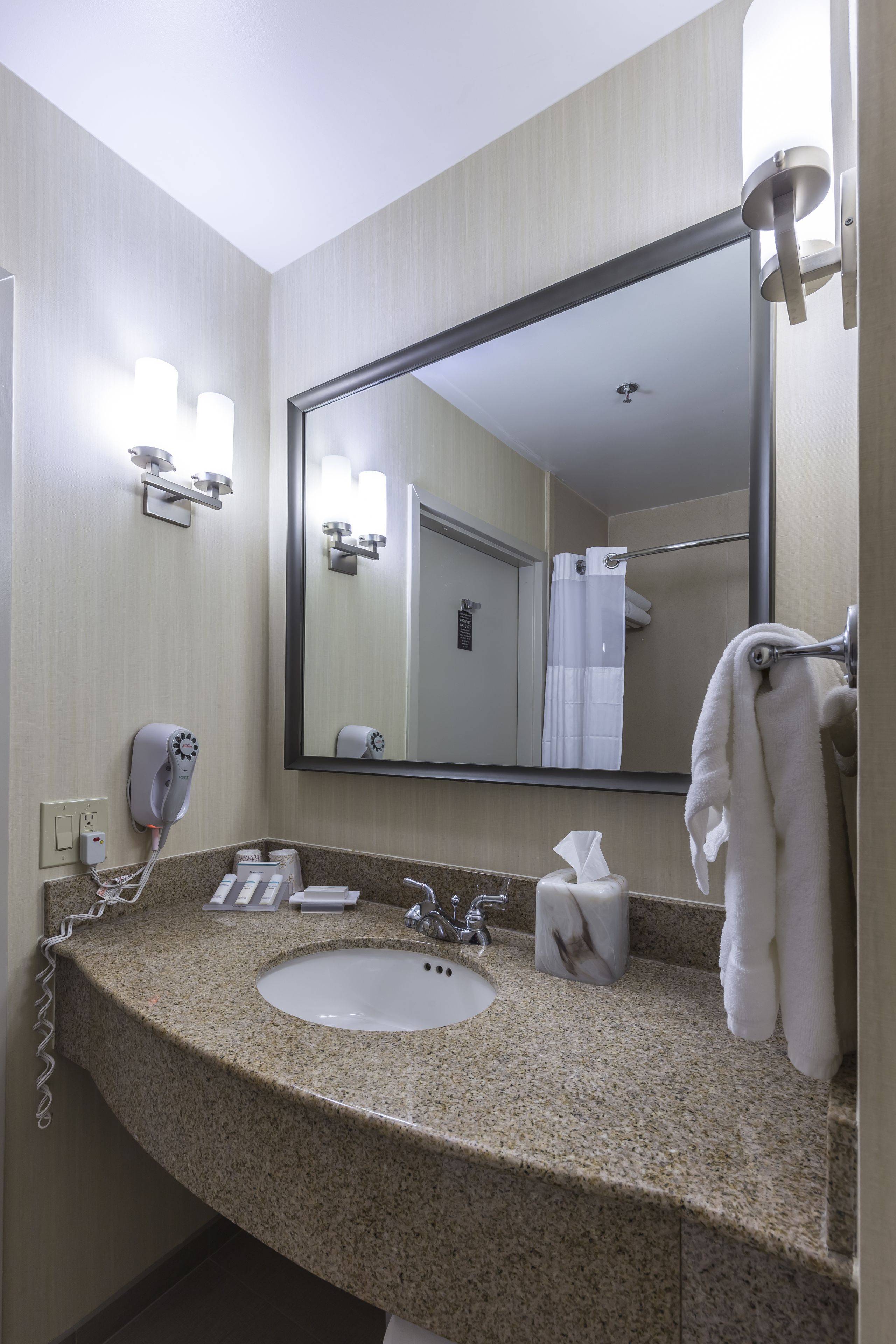 combined shower/bathtub, hair dryer, bathrobes, towels