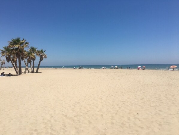 On the beach, white sand