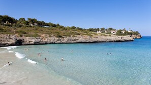 On the beach, white sand