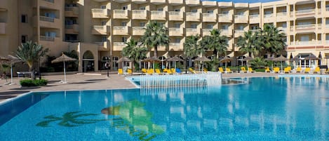 Indoor pool, outdoor pool, pool umbrellas, sun loungers