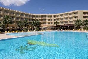 Indoor pool, outdoor pool, pool umbrellas, sun loungers