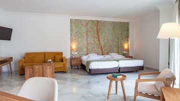 Ropa de cama de alta calidad, artículos del minibar gratis y escritorio