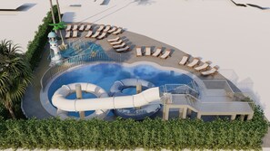 Indoor pool, outdoor pool, pool umbrellas, pool loungers