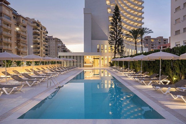 Outdoor pool, pool umbrellas, sun loungers