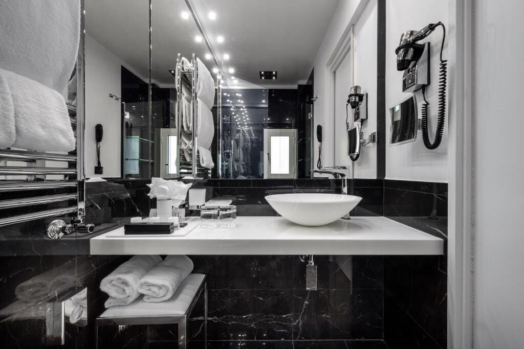 superior suite | bathroom | shower, free toiletries, hair dryer, bathrobes