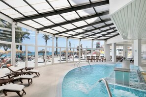 2 outdoor pools, pool umbrellas, pool loungers