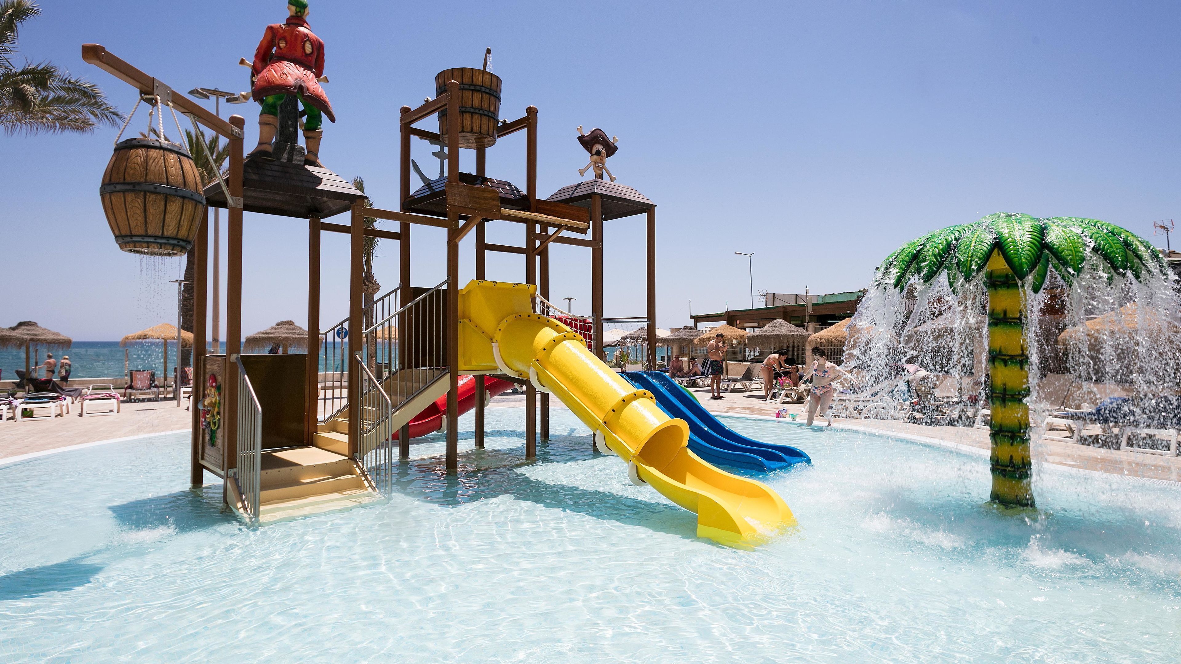 A water park with slides and a play structure.
