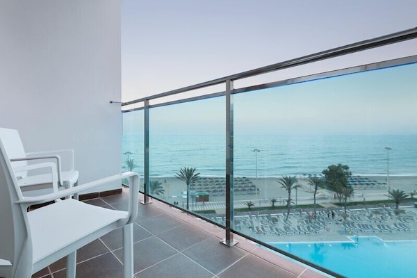 2 outdoor pools, pool umbrellas, sun loungers