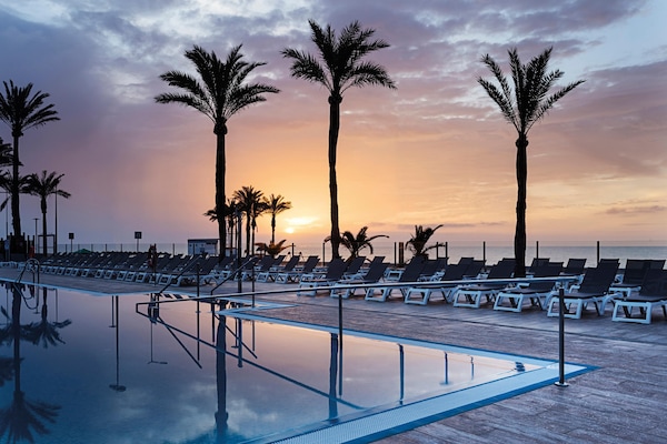 2 outdoor pools, pool umbrellas, sun loungers