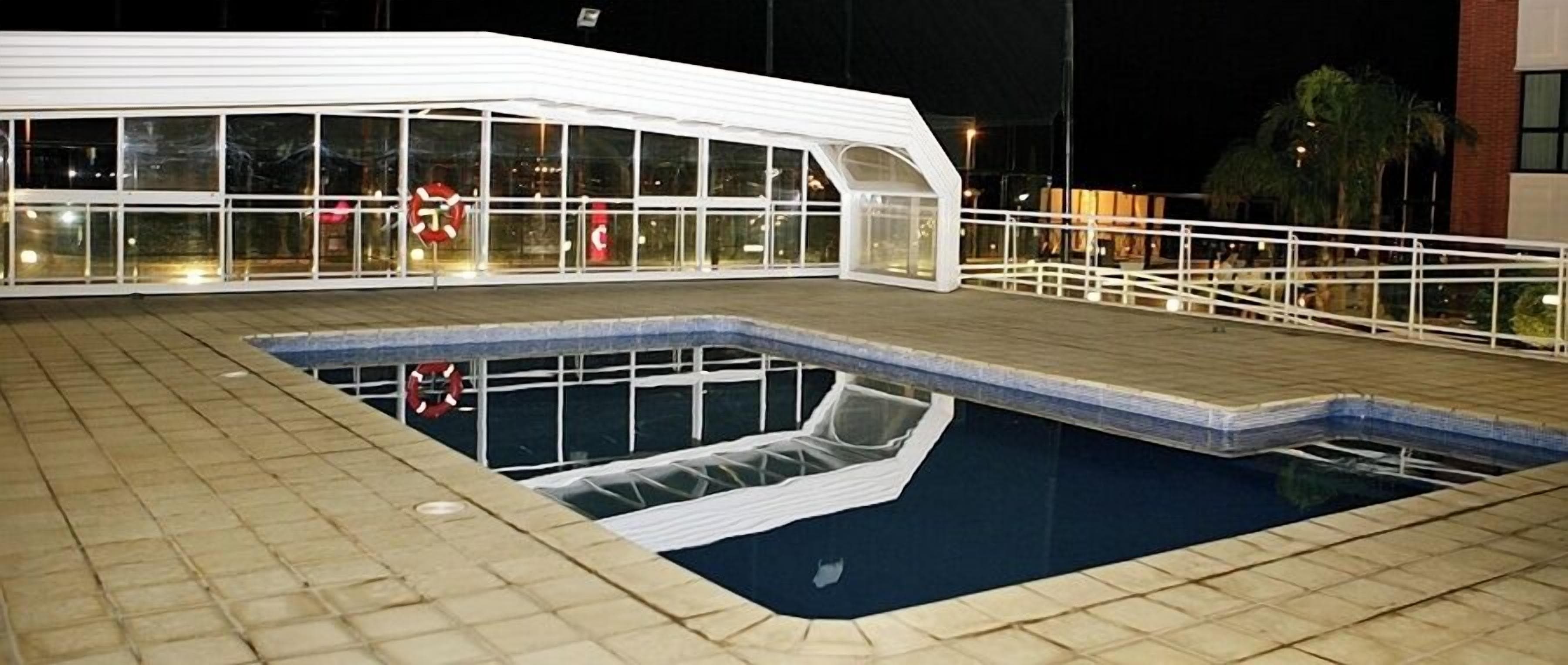 indoor pool, outdoor pool, pool loungers