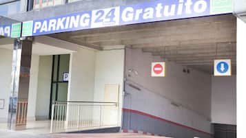 A parking sign indicating 24-hour parking availability.