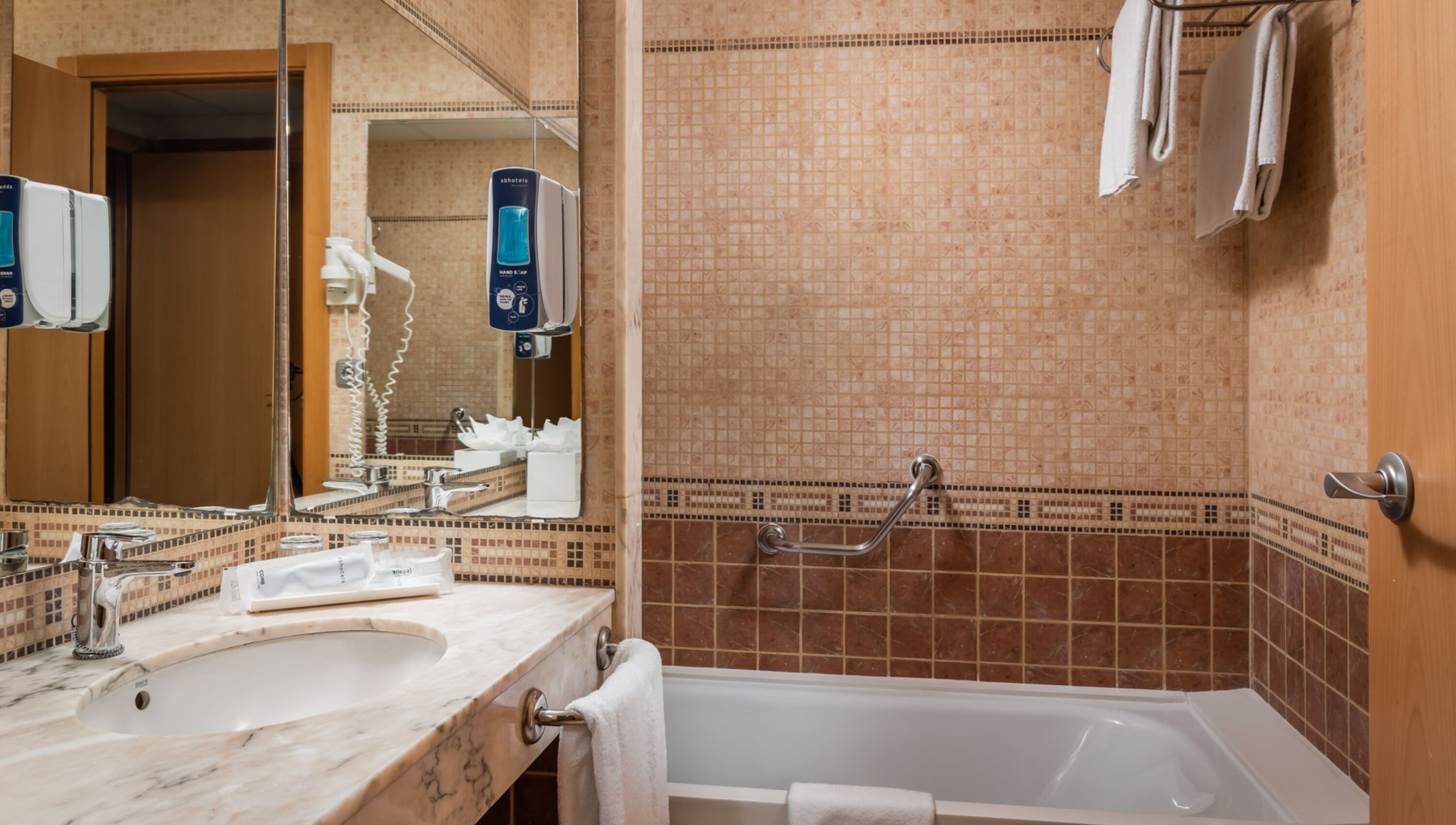 free toiletries, hair dryer, bidet, towels