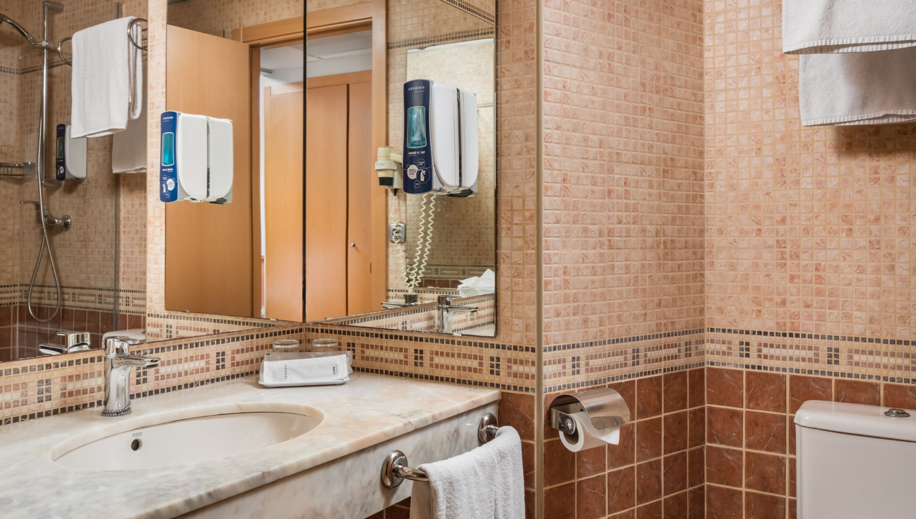 free toiletries, hair dryer, bidet, towels