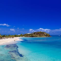 On the beach, white sand, free beach cabanas, sun loungers