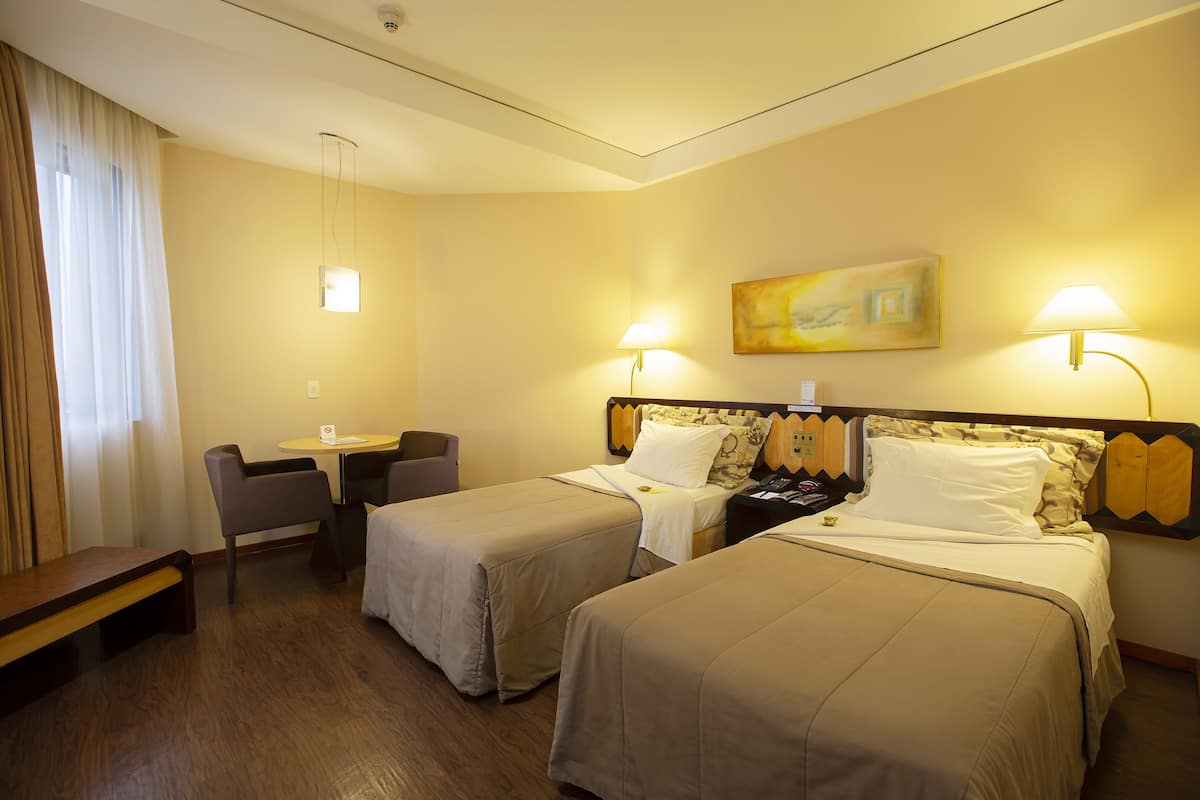 Deluxe Room, 2 Single Beds | Premium bedding, minibar, in-room safe, desk