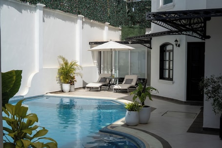 Outdoor pool, open 8:00 AM to 9:00 PM, sun loungers