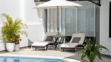 Outdoor pool, open 8:00 AM to 9:00 PM, sun loungers