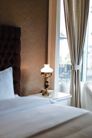 Premium bedding, down duvets, Select Comfort beds, minibar